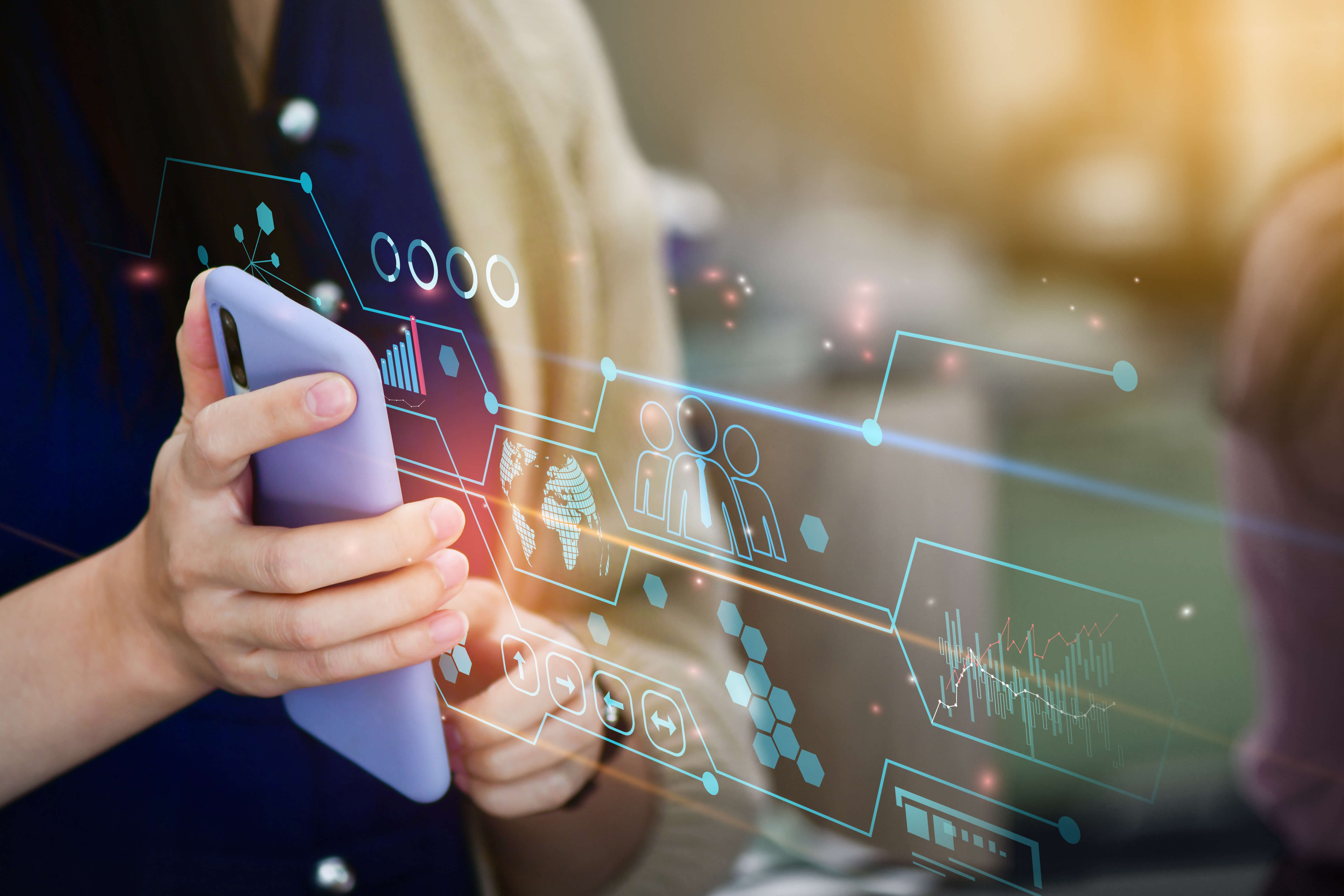 Woman holding phone with technology and data overlay