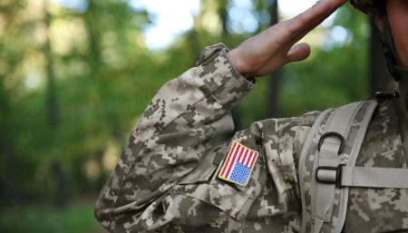 Image of a military person saluting